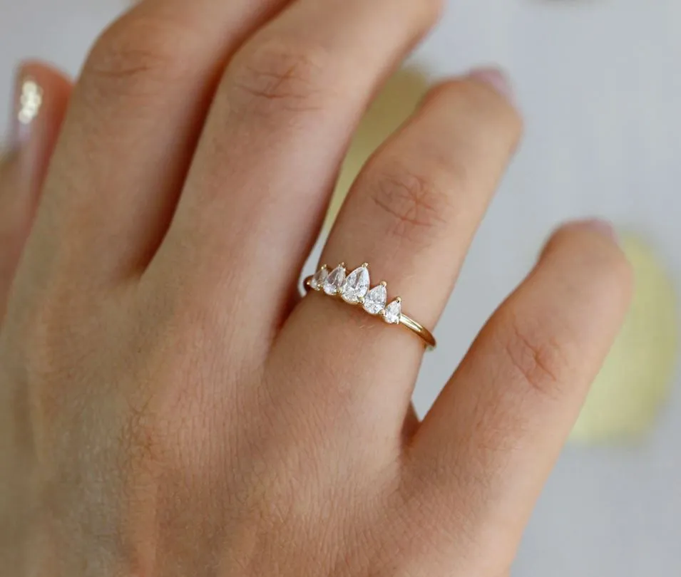 18K Gold and Five Graduated Pear Diamond "Unique" Ring