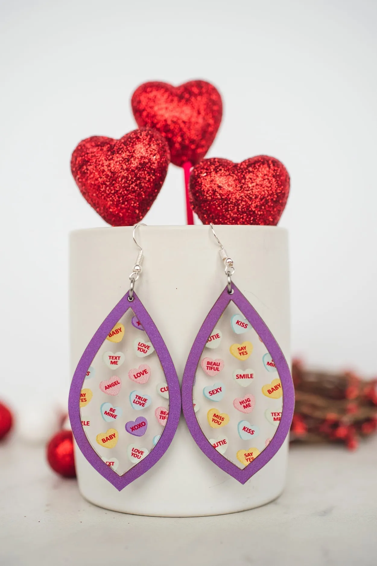 Conversation Heart Inset Dangle Earrings in Purple
