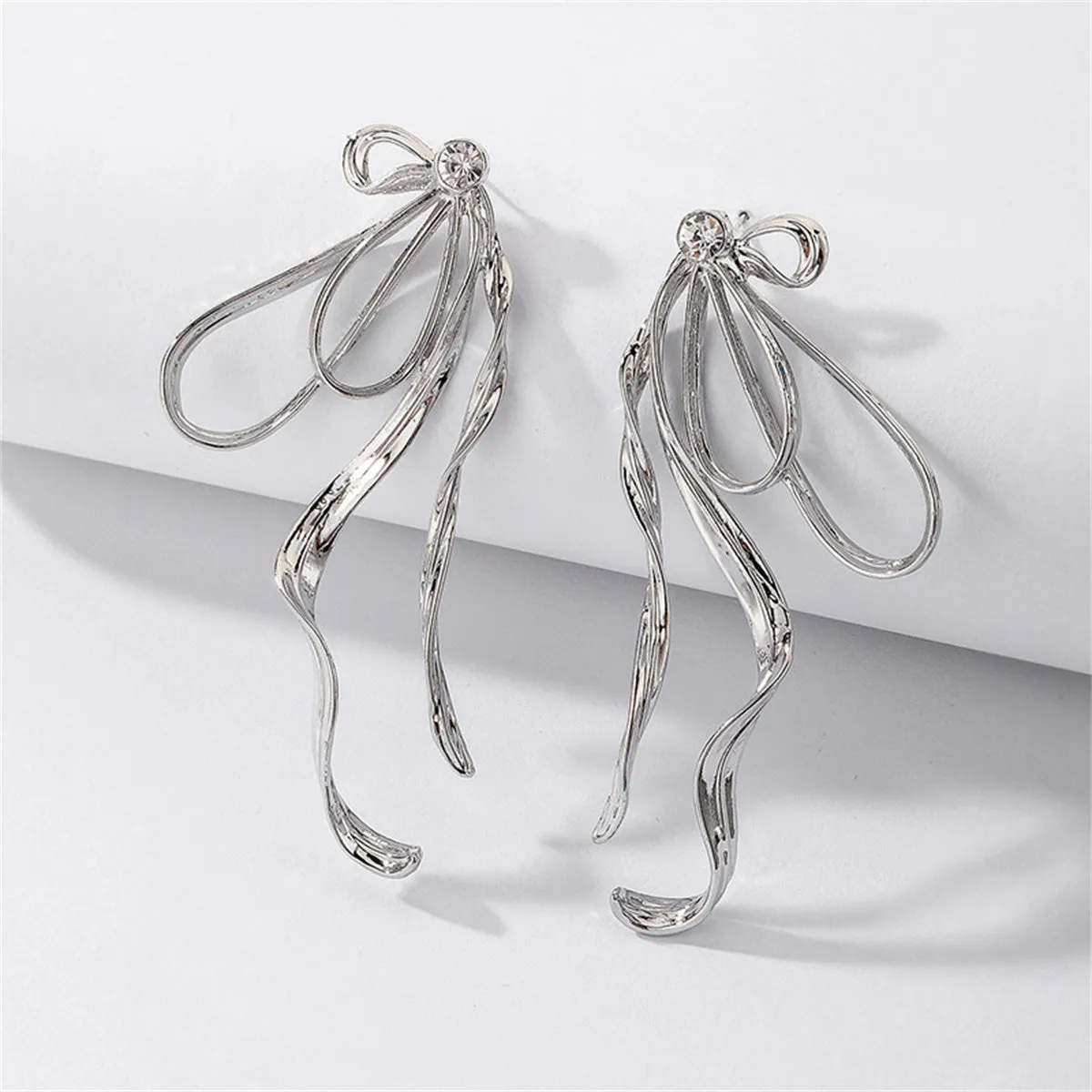 Cubic Zirconia & Silver-Plated Twist Bow Drop Earrings
