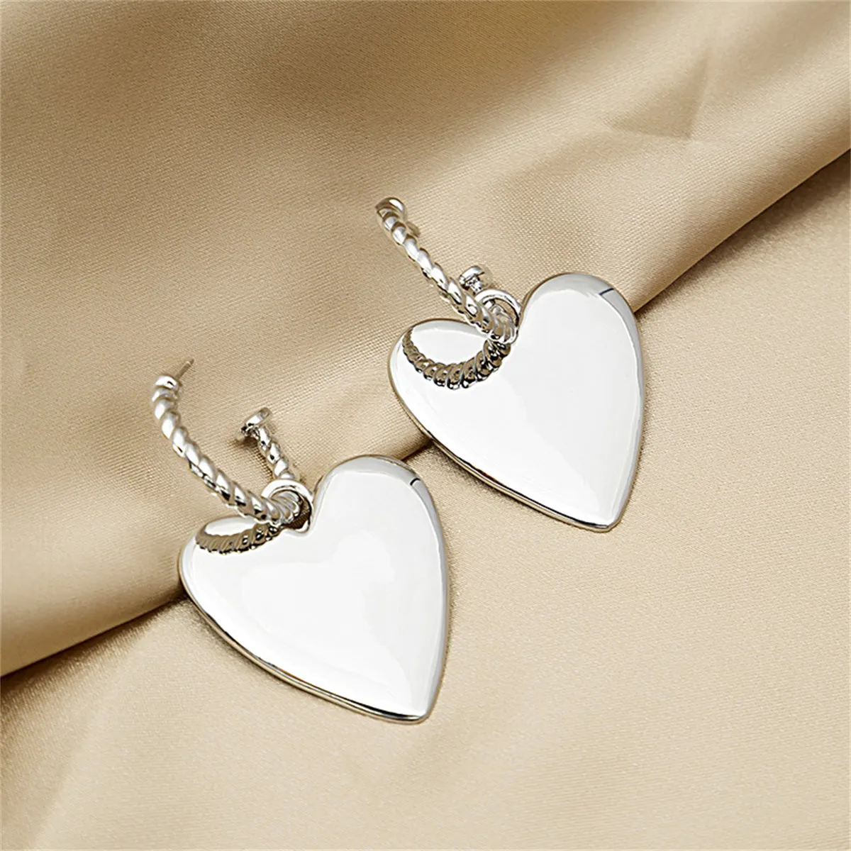 Silver-Plated Heart Huggie Earrings