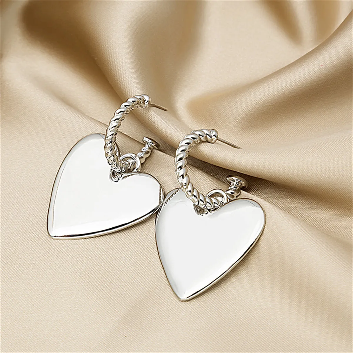 Silver-Plated Heart Huggie Earrings
